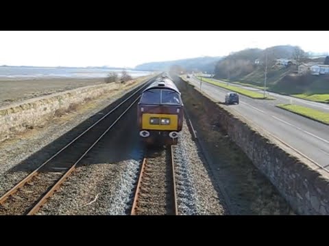 D1015 Western Champion trys to take out my 'pound coin' balanced camera, as she roars past with the 1Z15 06:00 "The Irish Mail" Ealing Broadway-Holyhead Pathfinder railtour Ffynnongroew near Mostyn Junction. I prefered the full unedited version, so here it is.