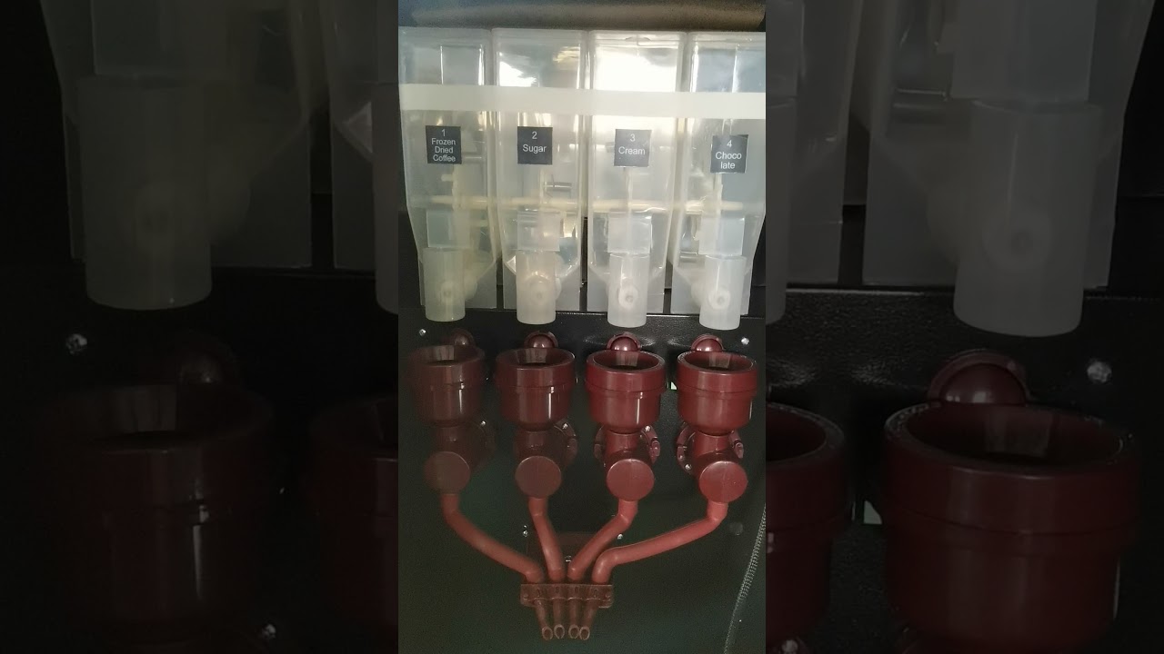 cashless coffee vending machine with credit card reader functions.