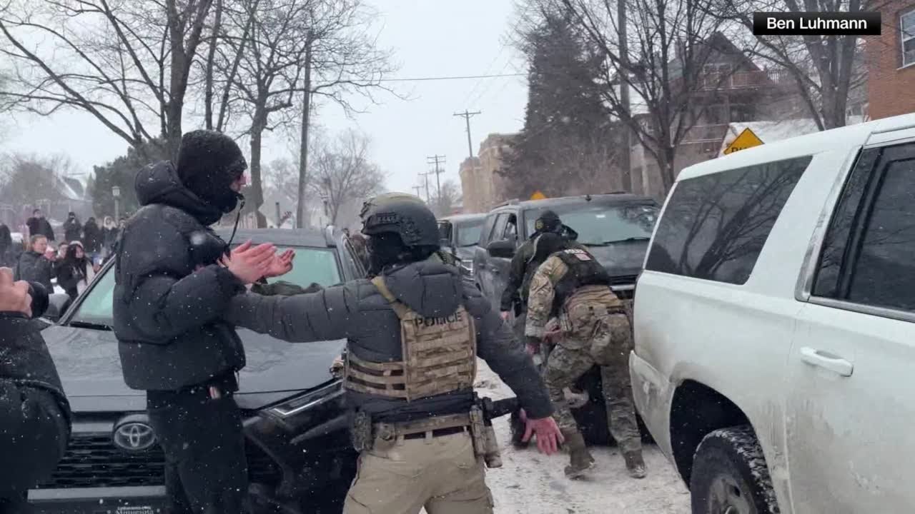 Gregory Bovino throws tear gas at protesters in Minneapolis