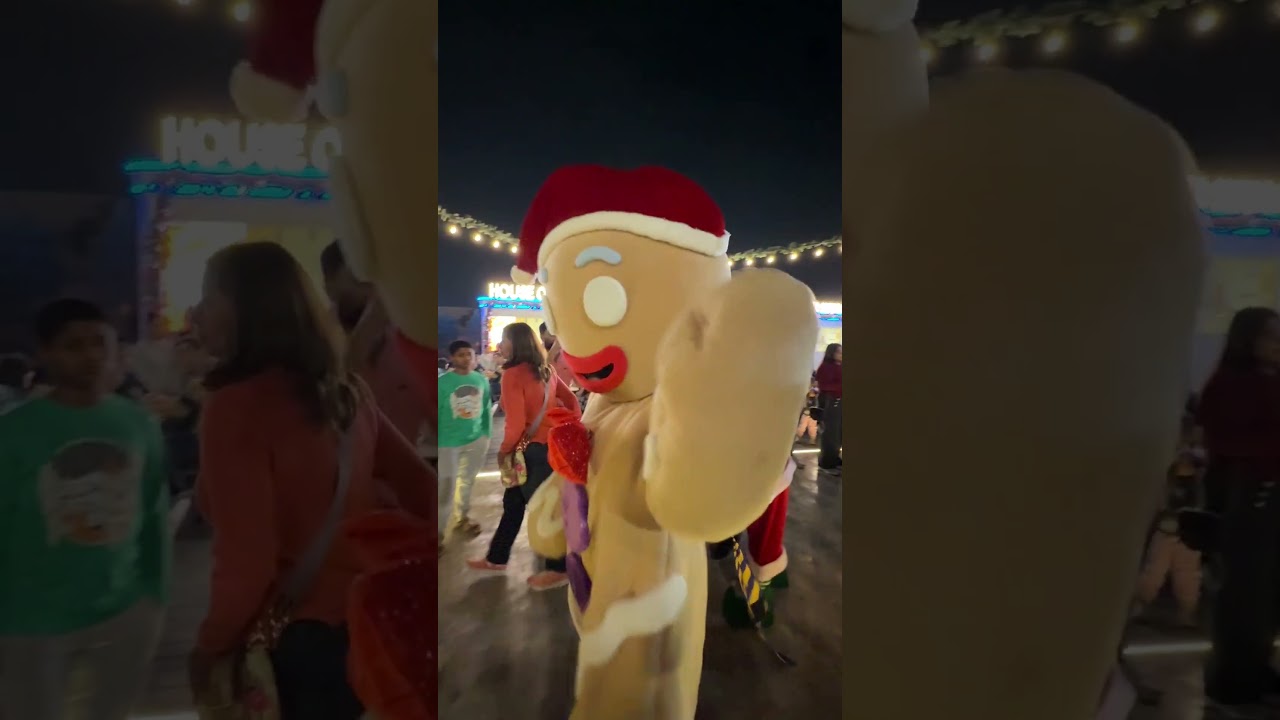 Gingerbread Man with performers at The Bay by Social at Festival City Mall in Dubai, UAE