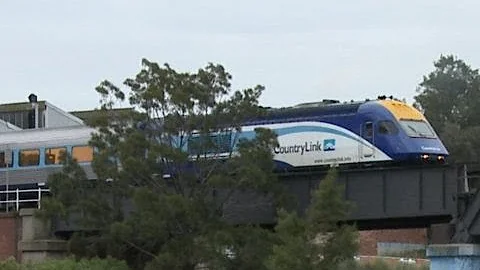 Countrylink XPT passenger train crossing a bridge in Melbourne Australia