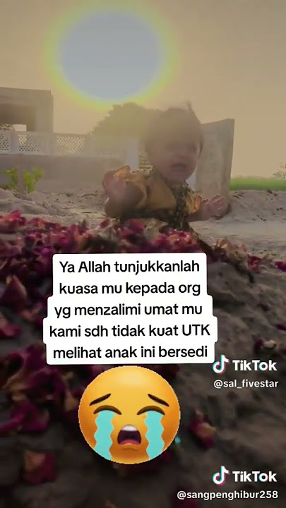 Anak ini menangis di atas  makam orang tua nya #prayforpalestine 🇵🇸