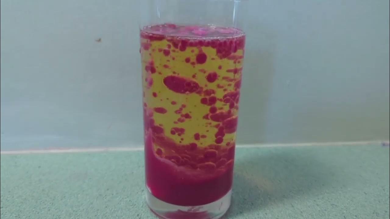 Lava lamp experiment with aspirin, water and oil/ simple science