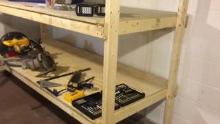 2x4 storage shelf out of plywood for shelves. Need any more information please leave comment. Quick and EZ storage solution.