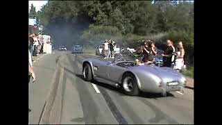 BURNOUT FRENZY. American cars having fun leaving a car show