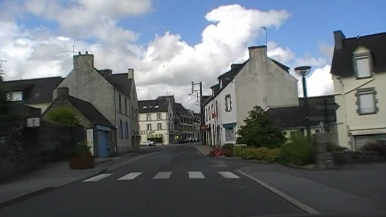 Driving Along Rue Joseph Pennec, 22110 Rostrenen, Côtes D'Armor, Brittany, France 12th July 2009