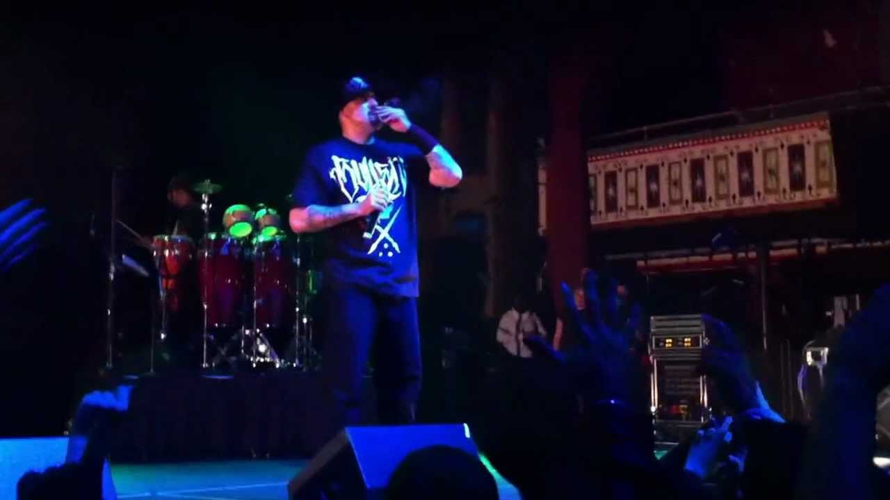 Cypress Hill. B-Real lighting a joint live on stage in Atlanta, GA.