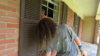 Removing an aluminium window from behind brick at 1401