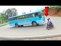 KL Private Bus and Bike &amp; More Cars Turning On Hairpin bend at Munnar Hills Road in Kerala