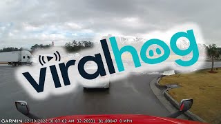 Dashcam Captures Crash in Front of Truck Stop || ViralHog