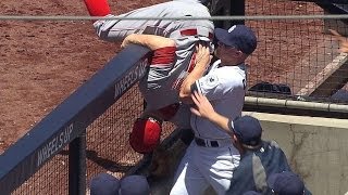 Frazier chases foul, almost flips into dugout