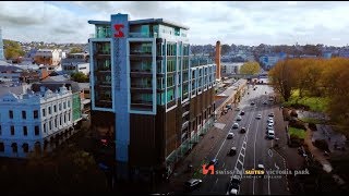 M.