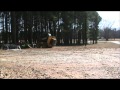 Skid steer wheelie while changing from pallet forks to bucket