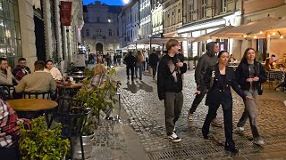 Львів: літні майданчики кафе і ресторанів, вуличні музиканти, суботня вечірня прогулянка центром