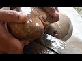 Memotong dan mengolah batu fosil aren by Watu atos