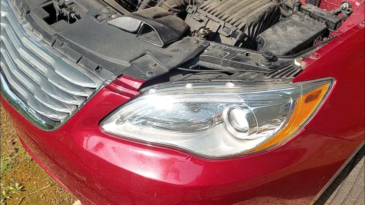The easiest way to change the driver's side headlight bulb in a 2011