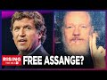 Tucker carlson visits julian assange in uk jail rising team reaction