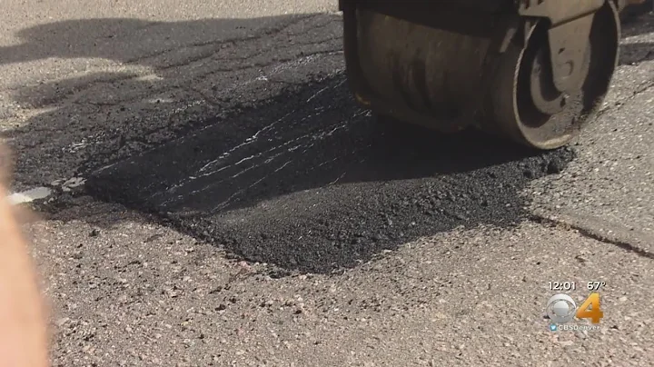 Crews Work To Fill Potholes Plaguing City Streets