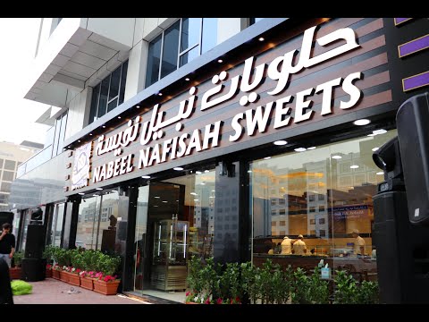 Buying Feras Nablus Kenafeh Sweets at Sharjah Heritage Area كنافة حلويات فراس النابلسية في الشارقة. 