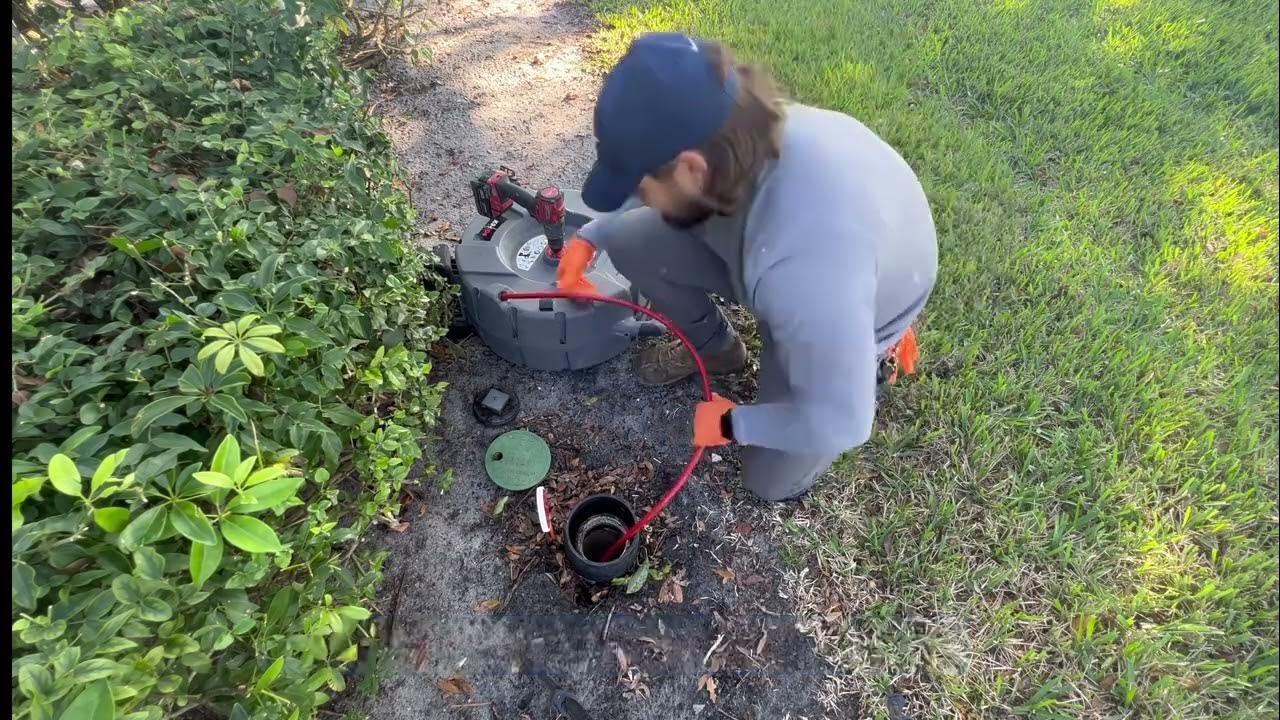 UNCLOGGING DRAIN LINE USING RIDGID FLEX SHAFT 204 DRAIN CLEANING
