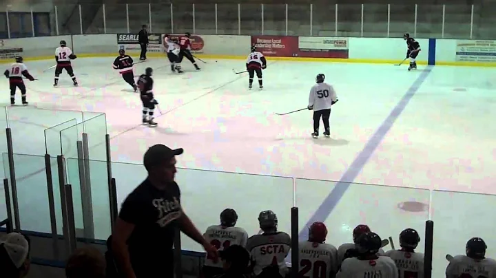 Junior hockey tryouts...big hit in front of the net