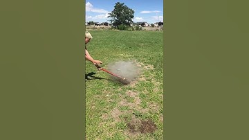 Cutting an axe bottle with an ax this time