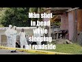 Man shot in head while sleeping at roadside