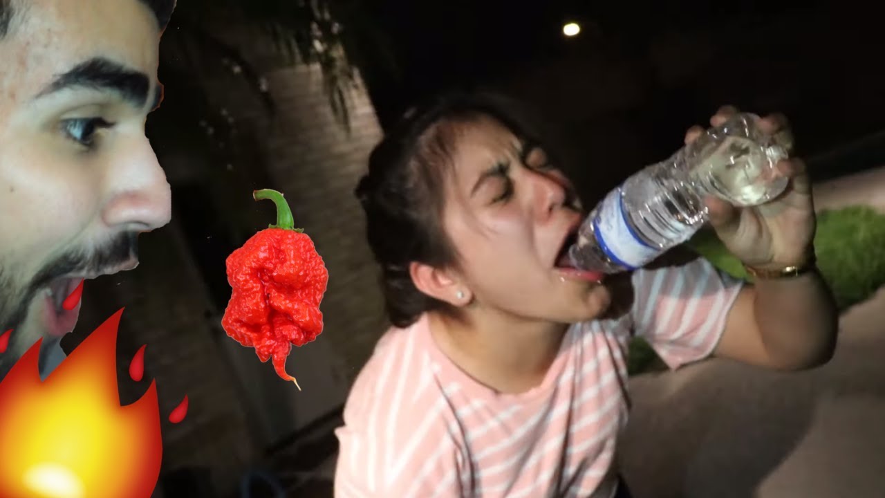 EATING THE WORLDS HOTTEST PEPPER!!! (PAINFUL) YouTube
