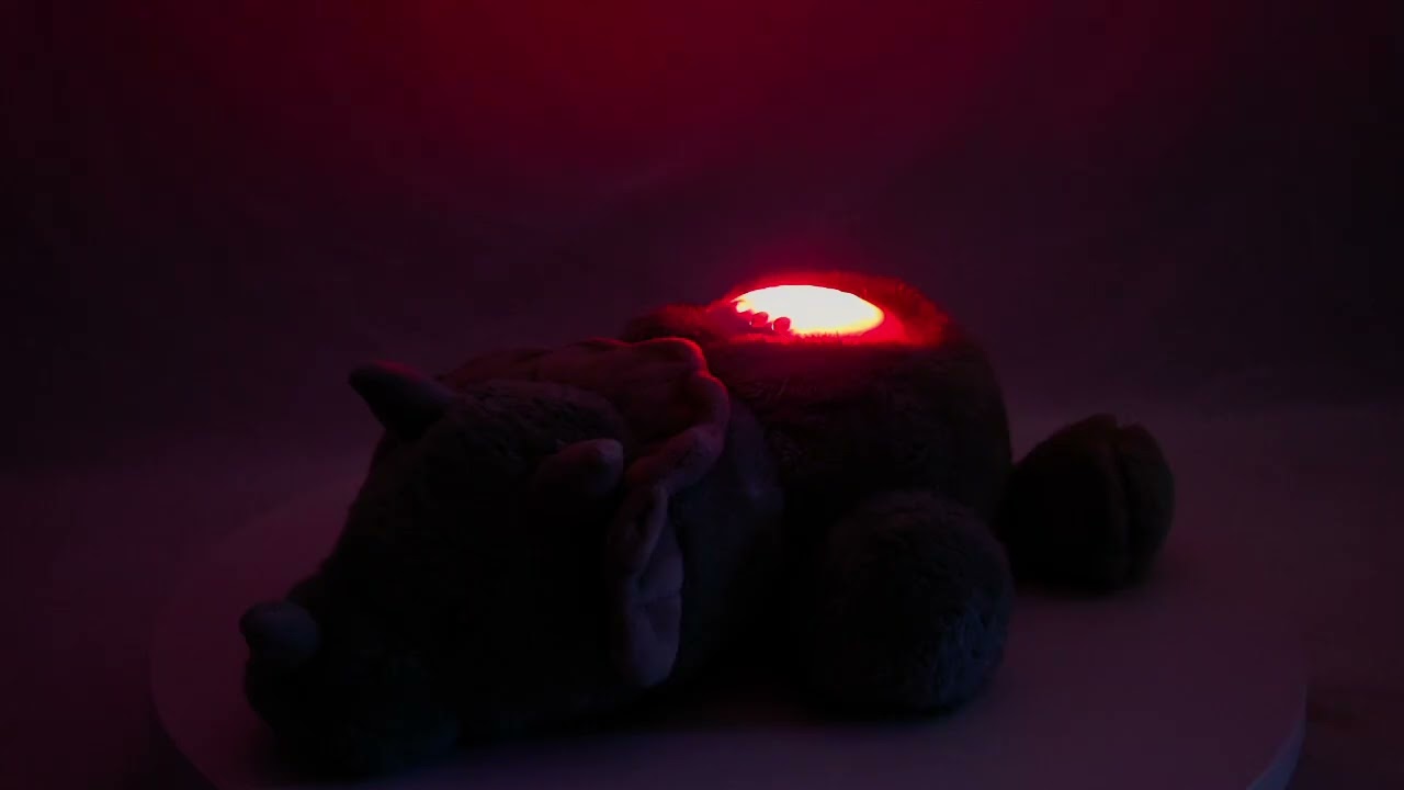 DreamGro Plush Baby Soother Musical Lullaby Projector with Light Show Dinosaur
