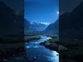 Full moon over a mountain valley