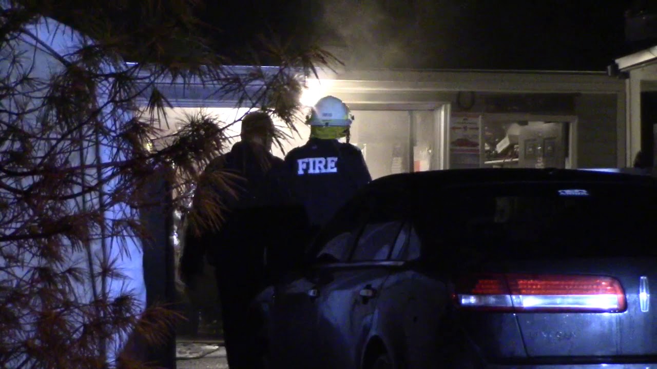 FIREFIGHTERS RESPOND TO VEHICLE FIRE INSIDE A GARAGE - YouTube