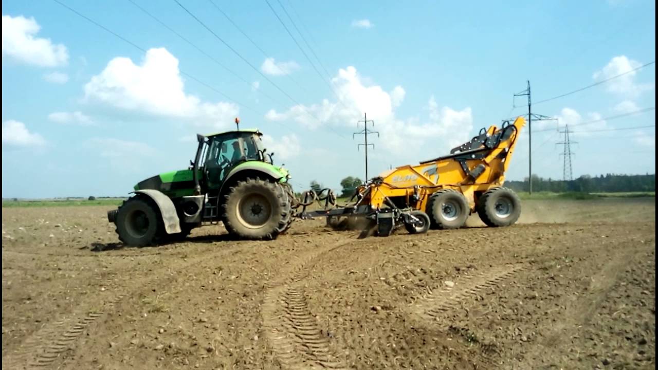 Сбор апельсинов машиной