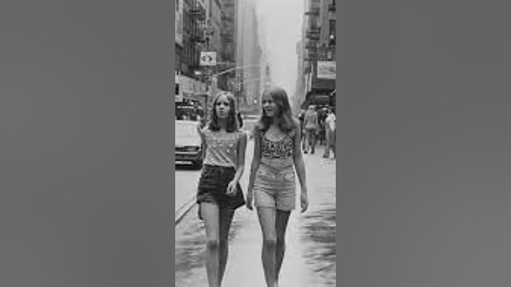 Two young women walking along Broadway between 48th and 49th Streets. New York 1969 | UNKNOWN FACTS