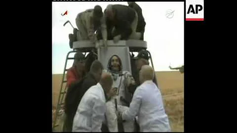 Soyuz capsule with 2 Russian cosmonauts and US astronaut lands