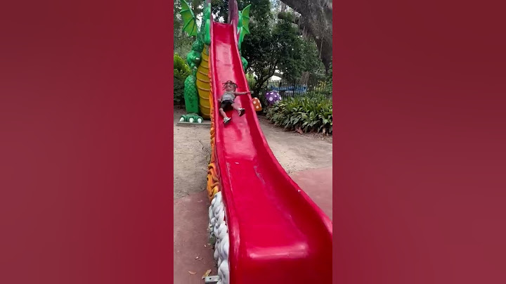 Kid Hits Head on Side of Slide - 1337813