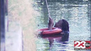 Firefighters rescue woman, dog trapped in canal near Beale Memorial Library