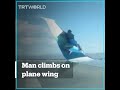 Man climbs onto wing of airplane before take off in Las Vegas