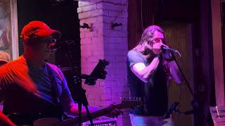 Billy Greg’s band playing at his place Henry’s on the Market 