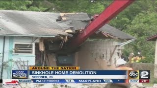 Crews to demolish home in sinkhole