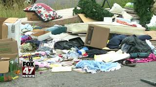 Trash piles up near donation bins