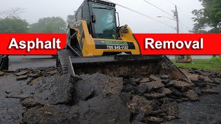 Removing asphalt driveway using ASV trackloader