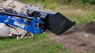 practicing on the loader bucket