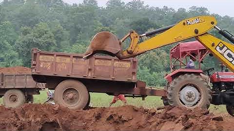 JCB Backhoe Machine Making Drain and Loading Soil in Tractor-JCB Working For Road Soil Construction