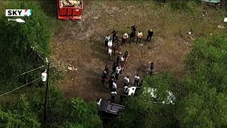 Authorities search woods behind home after Clay County couple’s hostage ordeal