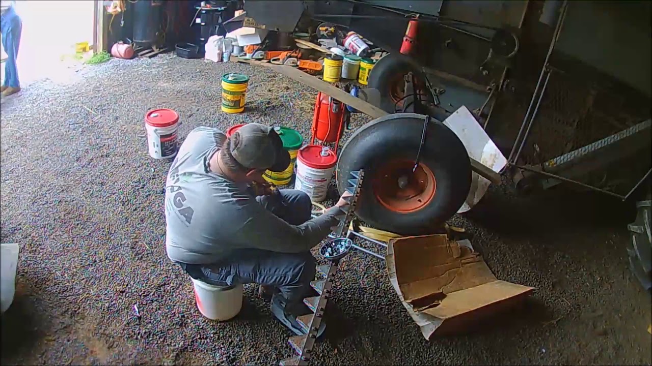 replaceing cutter bar teeth on the combine YouTube