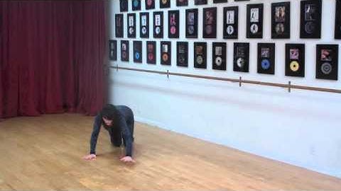 Video: Staggered Wide Arm Push Up