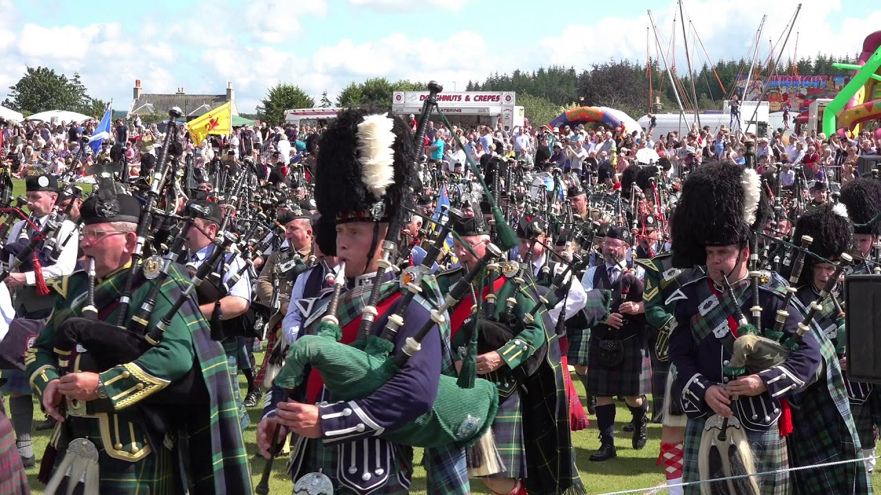 Massed Pipes & Drums afternoon parade at the 2019 Aboyne Highland Games