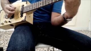 Wine box guitar -Winecaster demo This is a new guitar I made using a wine gift box, a stratocaster style neck and some pieces of a spruce (or pine) wooden shelf. Well,