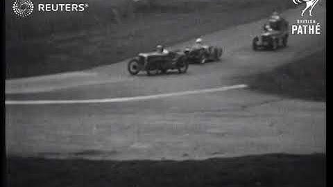 Motor racers compete on Donington Park road (1934)