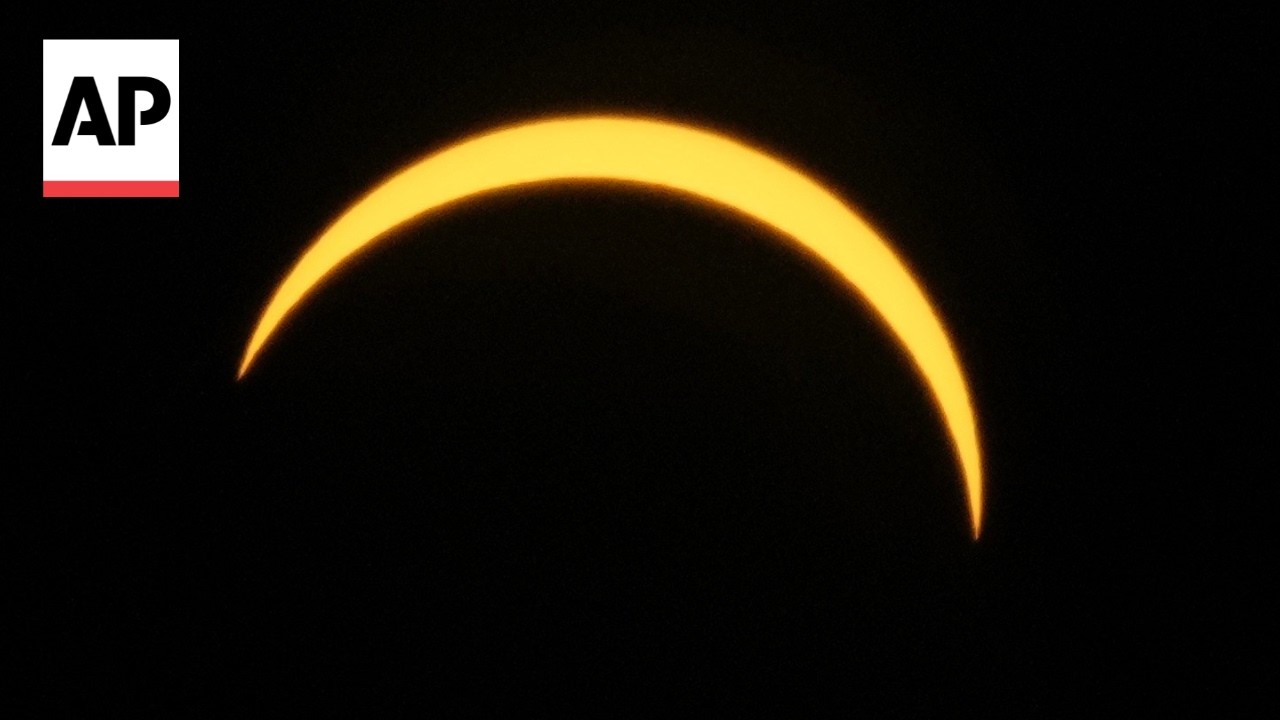 Timelapse video shows a partial solar eclipse in London